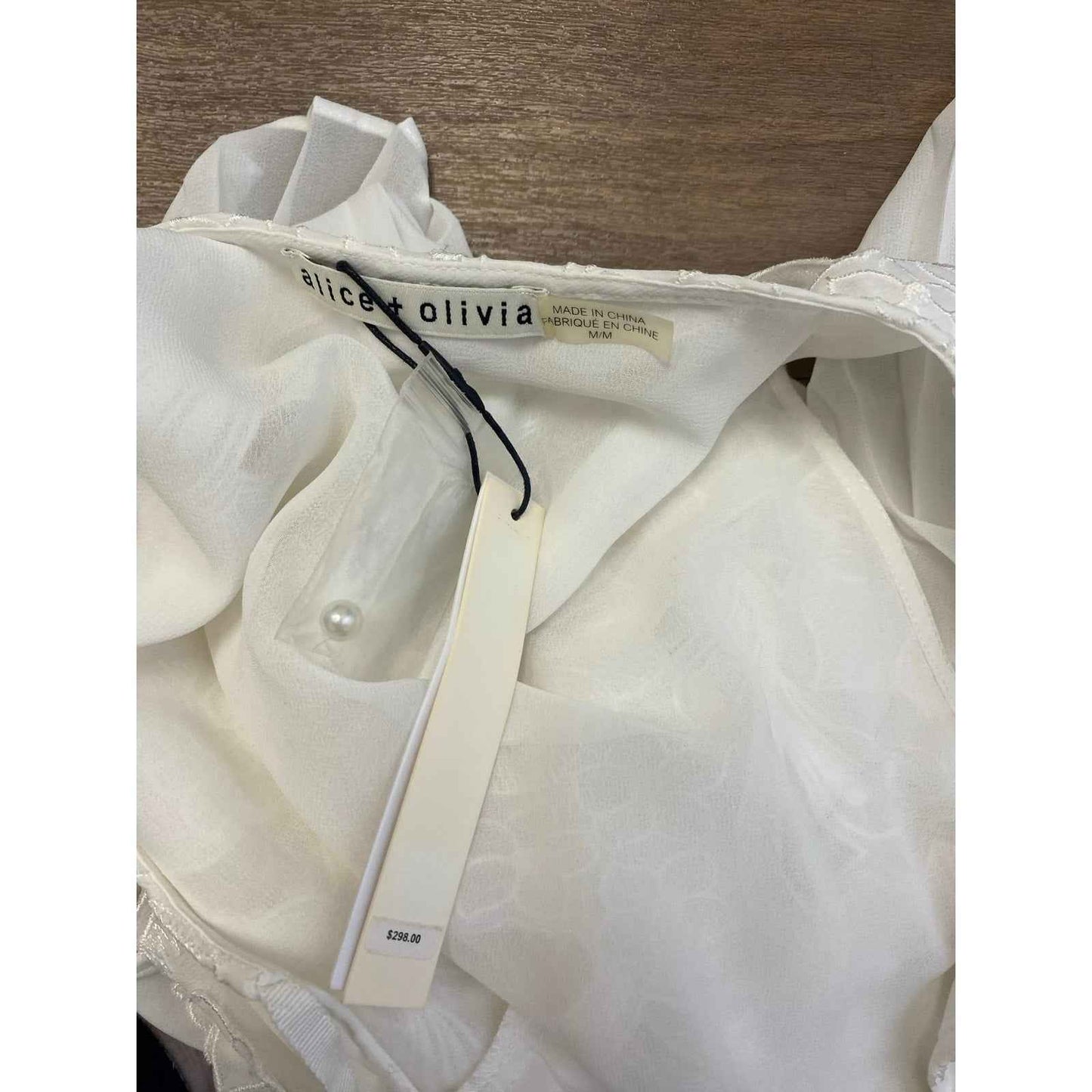 NWT Alice + Olivia Off White Sleeveless Pleated Blouse Sz M
