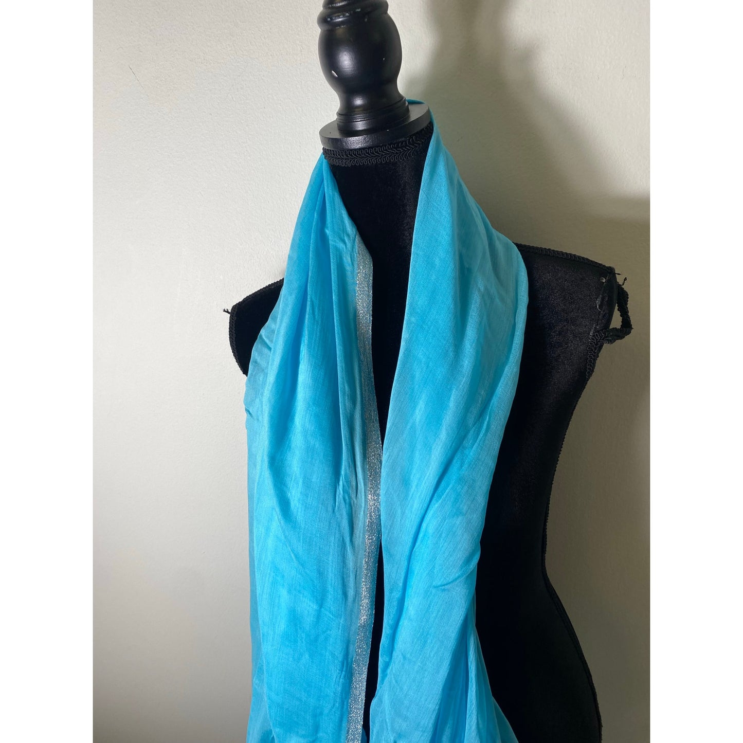 NWT Teal Scarf. Metallic accent threads