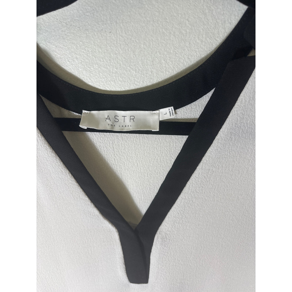 Astr Wite With Black Trim Oversize Top sz L