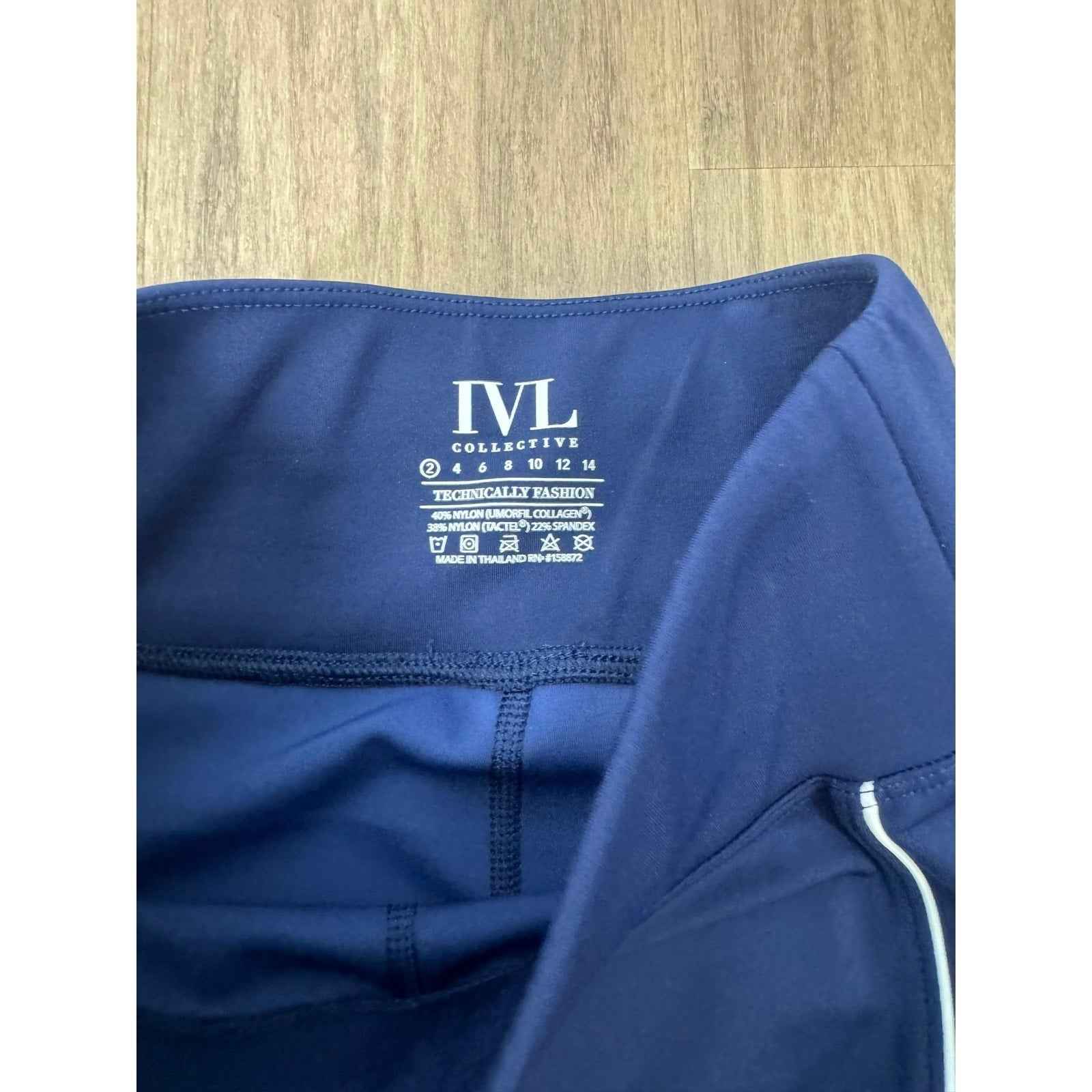 NWOT Ivy Collective Navy Blue and White Exercise Short Sz 2