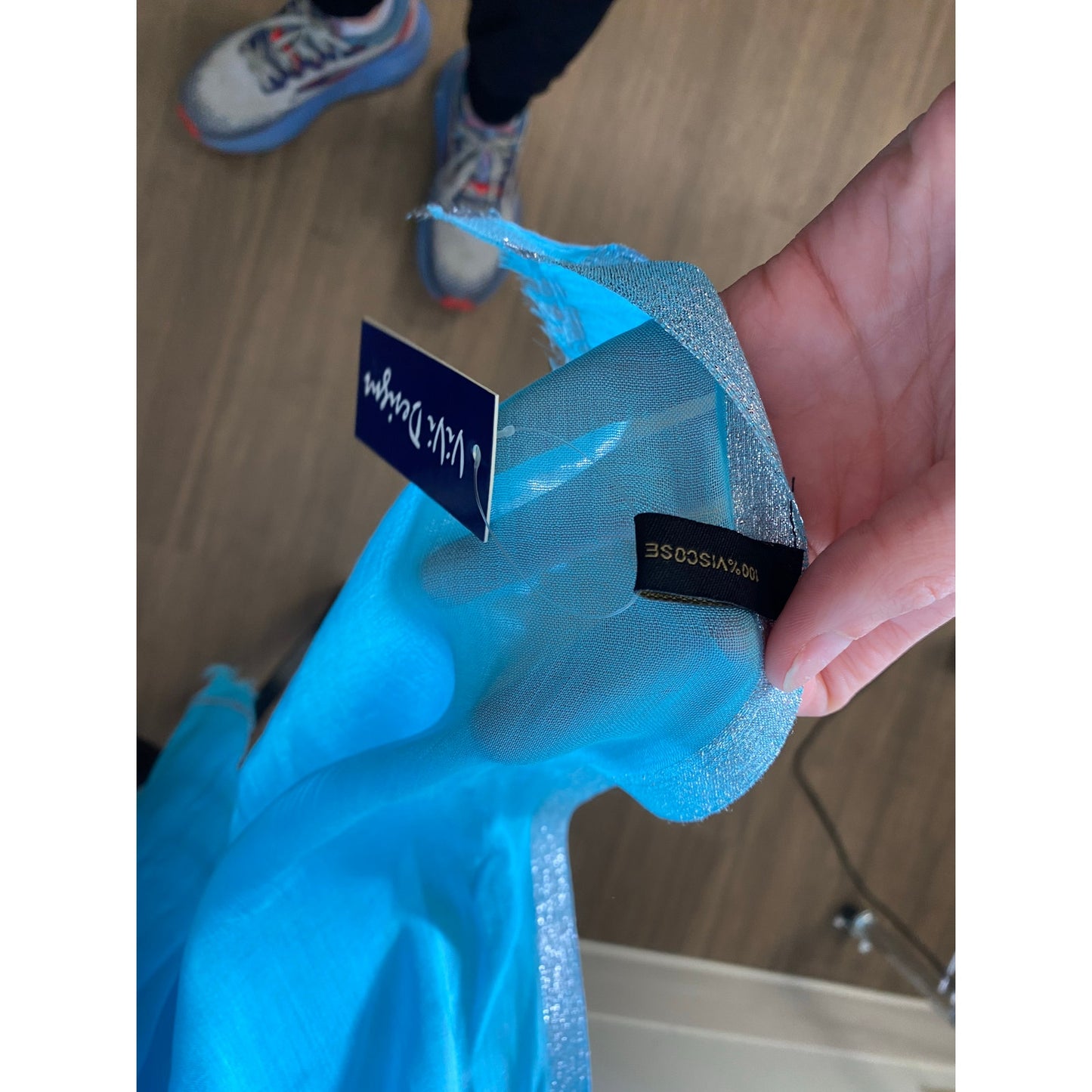 NWT Teal Scarf. Metallic accent threads